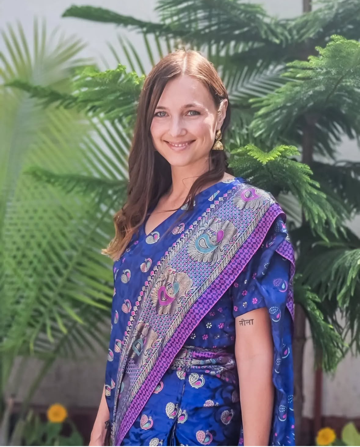 Natalia in a blue sari at the ashram near Rishikesh, India