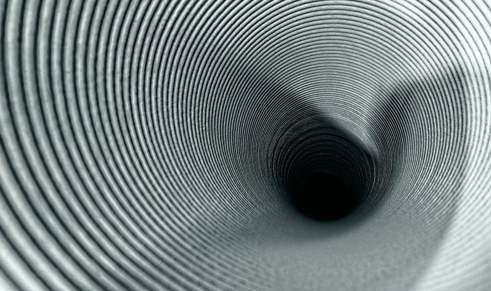 Close-up of a funnel, representing the rhythm of expansion and contraction
